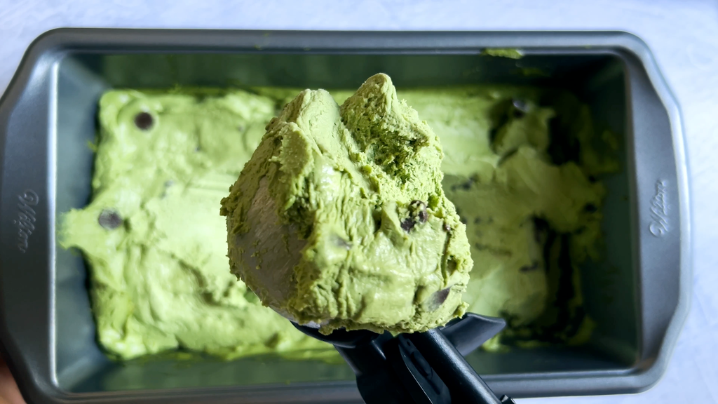 a scoop of mint chocolate chip ice cream overhead