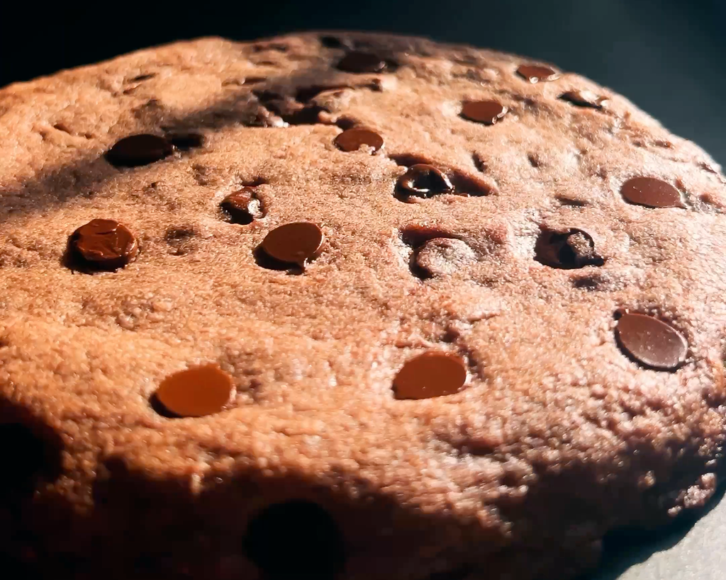 This is a recipe for a Gargantuan Protein Chocolate Chip Cookie, which is a healthy dessert and cookie recipe, sweetened with date syrup.